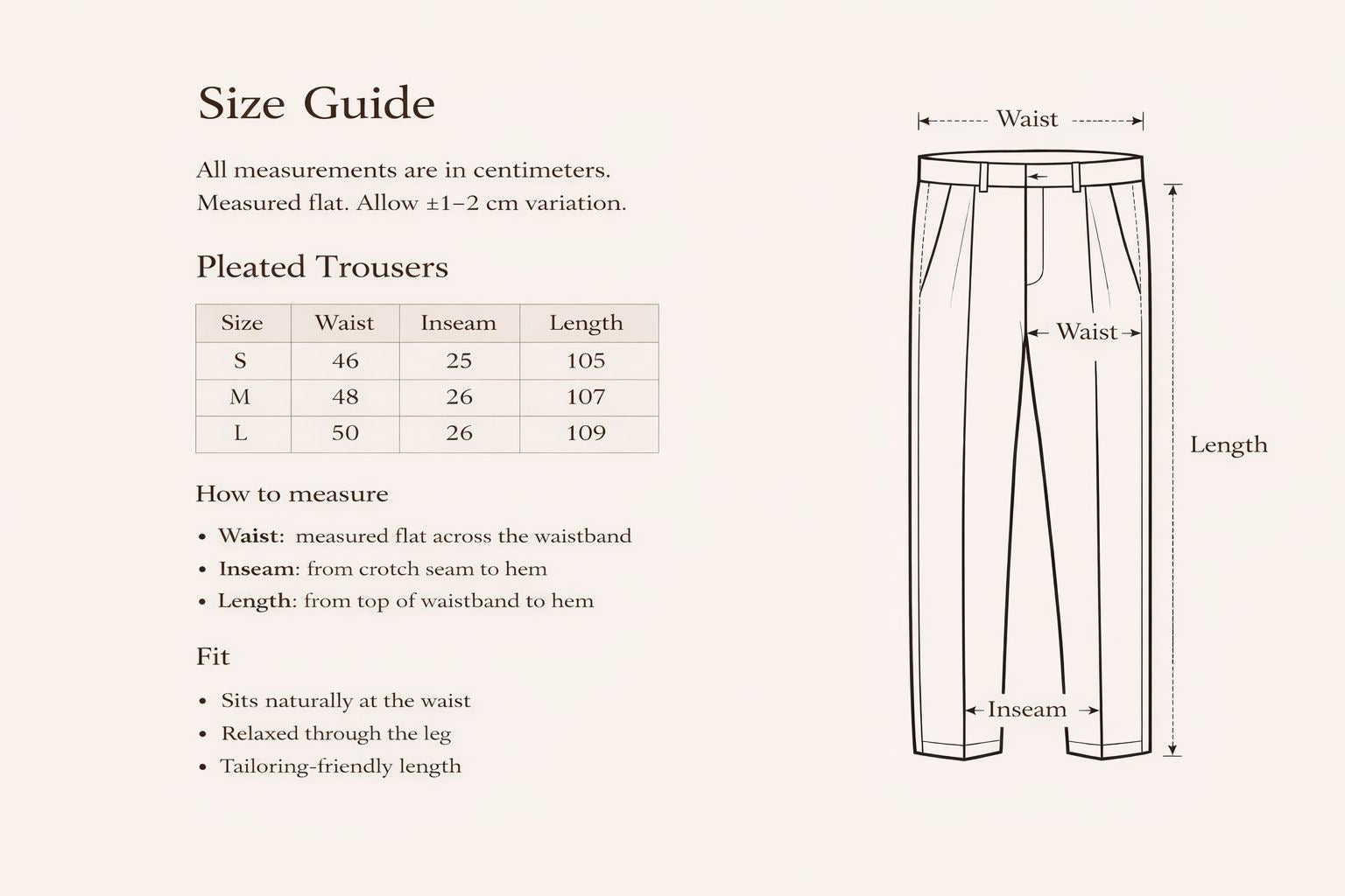 TAILORED PLEATED TROUSERS – BLACK