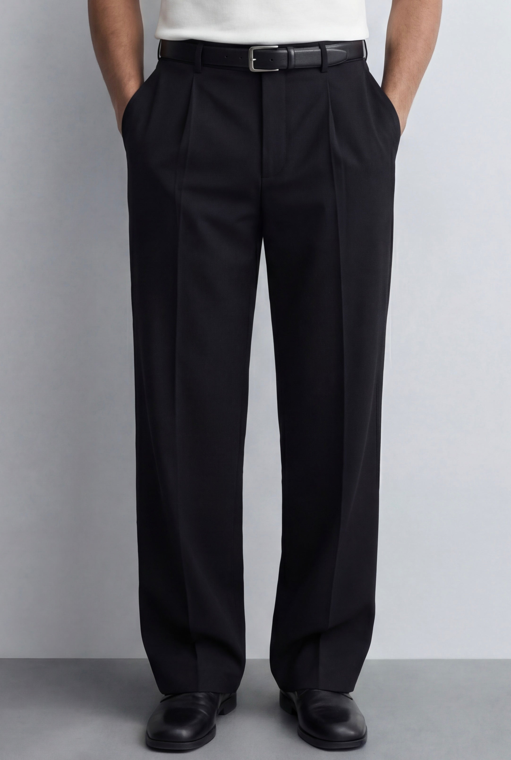 TAILORED PLEATED TROUSERS – BLACK