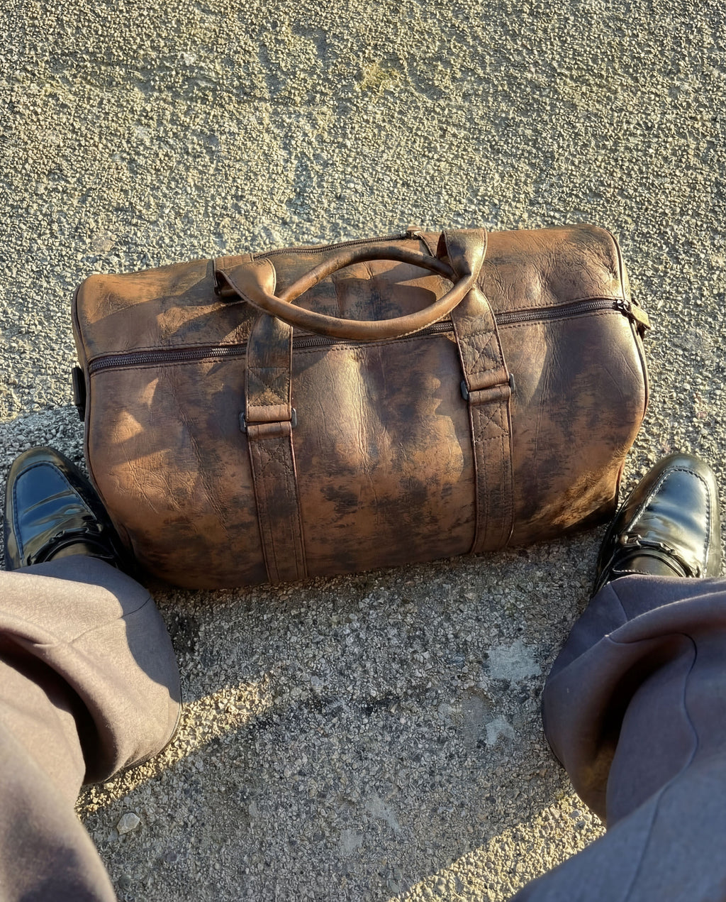 BROWN DUFFLE BAG